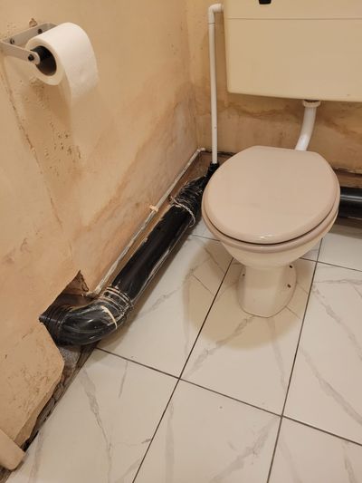 Toilet Floor Collapse — after